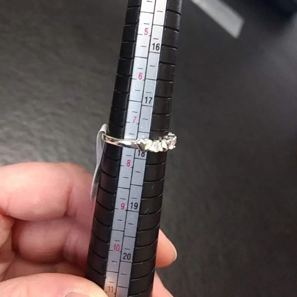 Silver tone heart and rhinestone ring size approx 7.5